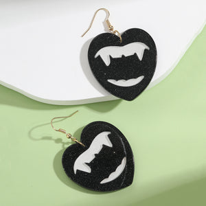 fang earrings