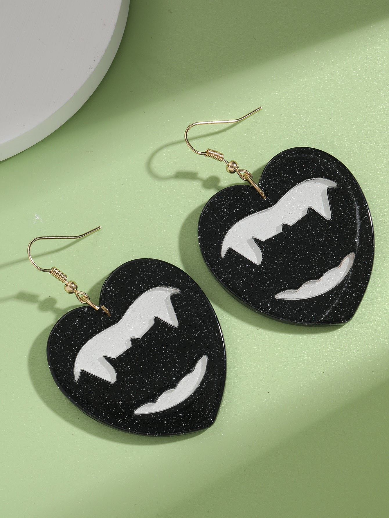 fang earrings