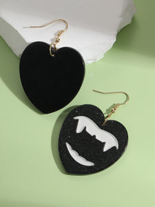 fang earrings