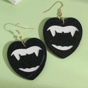 fang earrings