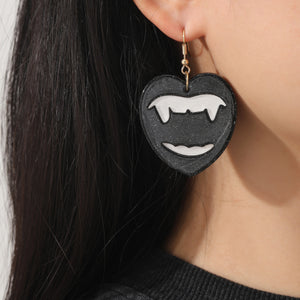 fang earrings